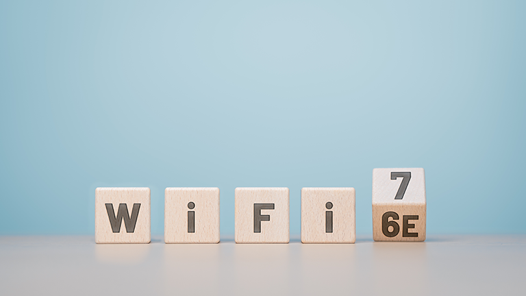 wooden blocks with letters showing wifi 7